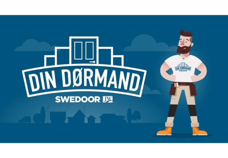 Sydkystens Vinduer logo med tegneseriefigur foran by- og hussilhuet.